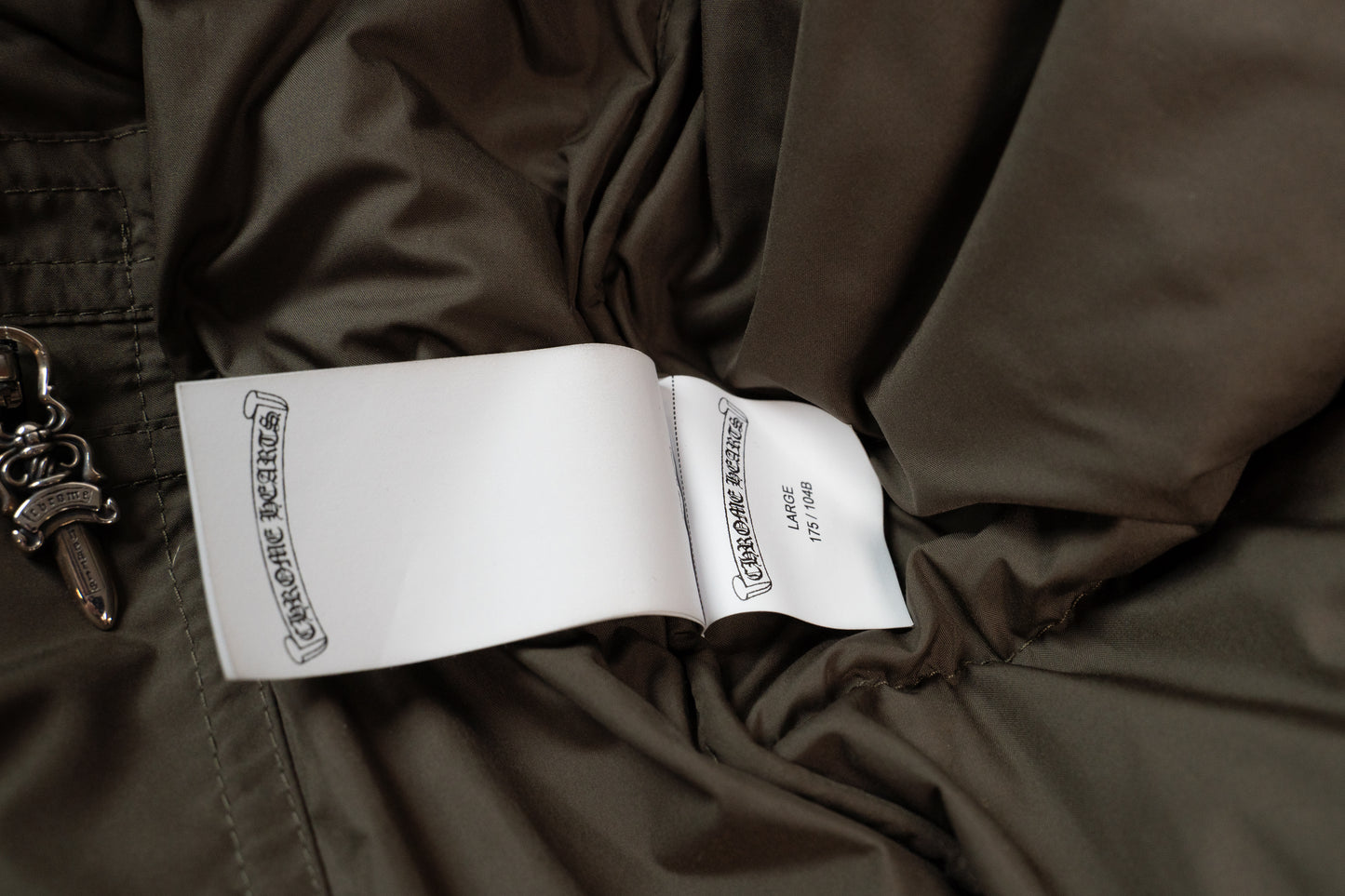 Olive Monogram Cross Puffer Down Jacket