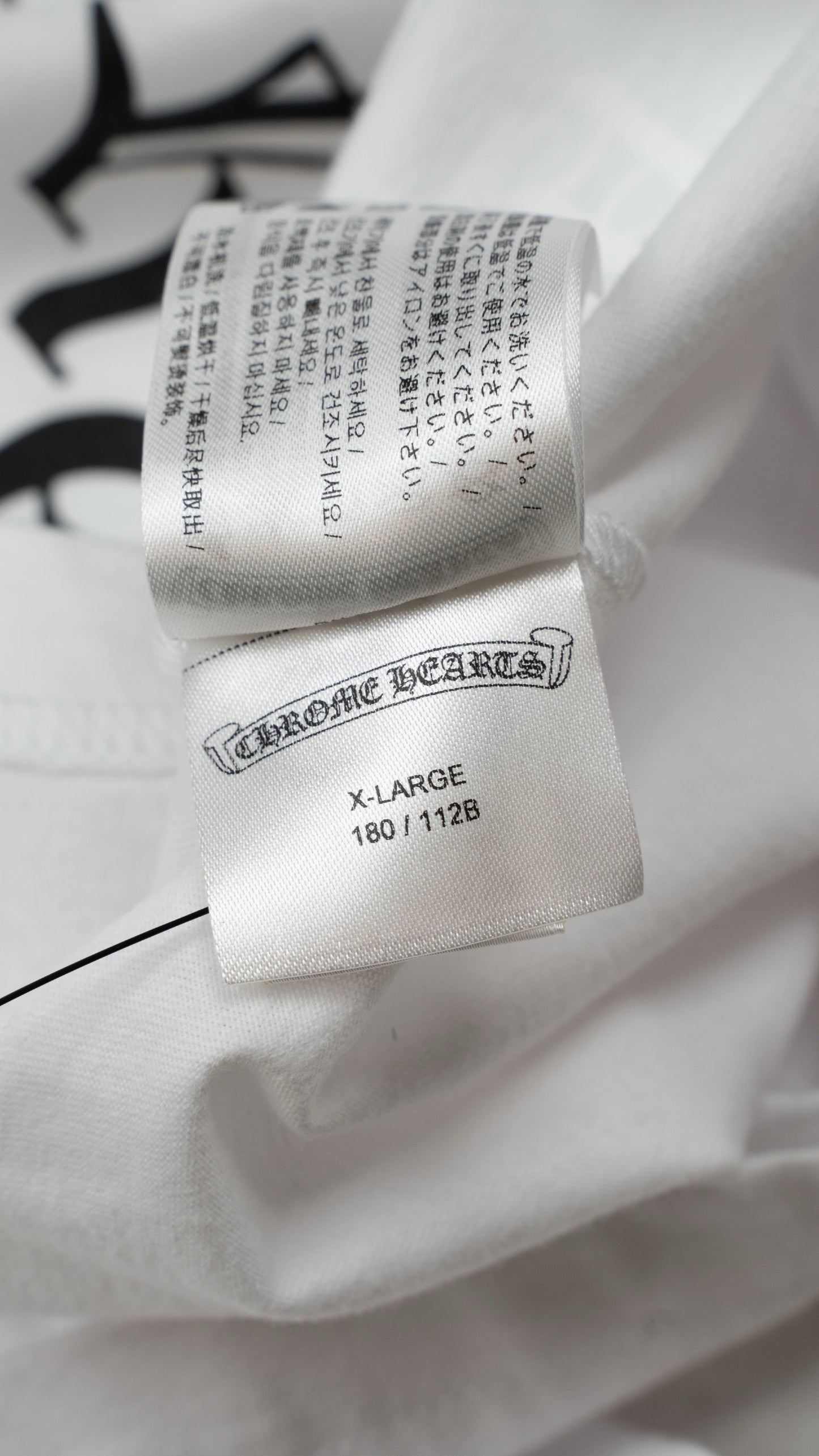 White' Floral Horseshoe Pocket Long Sleeve